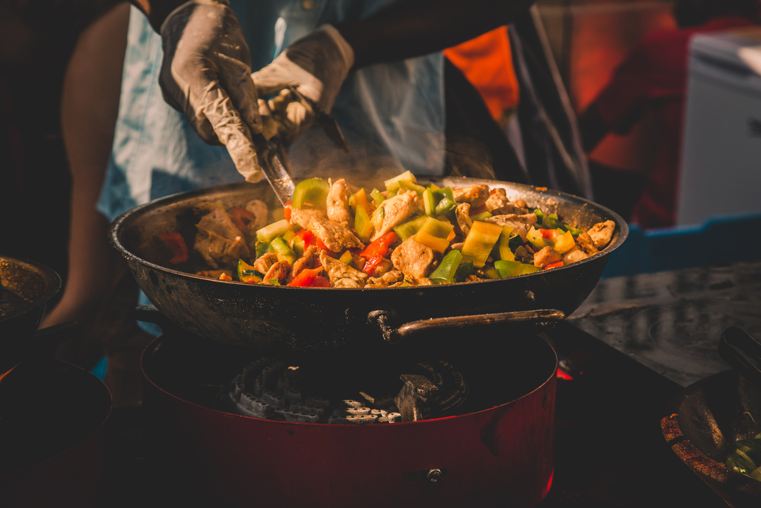 Cheff Cooking Fusion International Cusine on Street Stall on International Street Food Festival of Odprta Kuhna, Open Kitchen Event, in Ljubljana, Slovenia